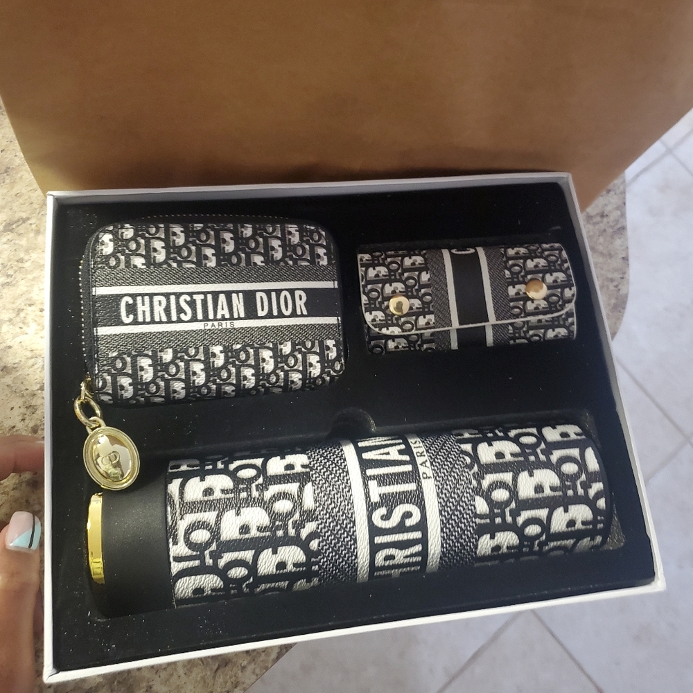 Christion Dior tumbler and Wallet set